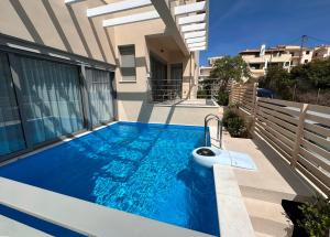 Bazén v ubytovaní RVG A3 Luxury House with Pool in Portoheli alebo v jeho blízkosti