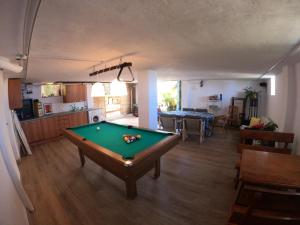 a living room with a pool table in it at Double Room at Villa Lila in Puerto de la Cruz