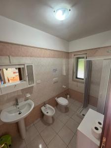 Ванная комната в Villa Angela case vacanza