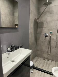 Koupelna v ubytování Hotel Ergi + 37 fotografií