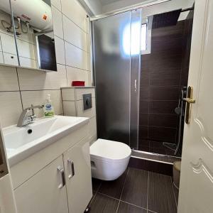 Ванна кімната в Central Apartments Ariadni