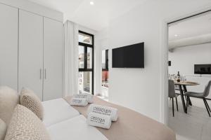 TV a/nebo společenská místnost v ubytování OBSIDIAN Ático Mencey