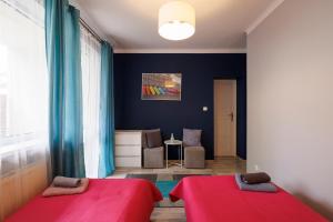 Postel nebo postele na pokoji v ubytování Apartamenty przy Parku