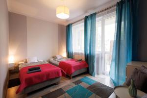 Postel nebo postele na pokoji v ubytování Apartamenty przy Parku