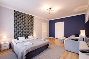 Postel nebo postele na pokoji v ubytování Apartamenty przy Parku