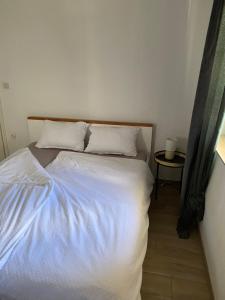 Ένα ή περισσότερα κρεβάτια σε δωμάτιο στο Place for two