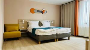 Voodi või voodid majutusasutuse Hotel Libers toas