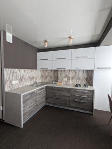 Kuchyň nebo kuchyňský kout v ubytování CosHOME - apartament