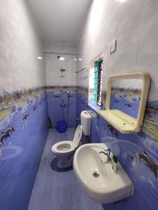 Ένα μπάνιο στο Sai Beach Stays