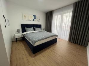 Ένα ή περισσότερα κρεβάτια σε δωμάτιο στο Modern apt near city centre
