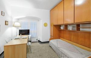 TV a/nebo společenská místnost v ubytování Cosy Apartment In Genova