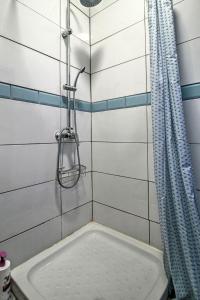 a bathroom with a shower and a bath tub at Finca el Almendro Archez in Árchez
