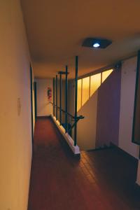 an empty hallway with a staircase in a building at Hosteria Pia Guapi in Colón