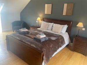 Voodi või voodid majutusasutuse Reenconnell Dingle toas