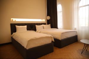 Postel nebo postele na pokoji v ubytování BARBAR APART HOTEL