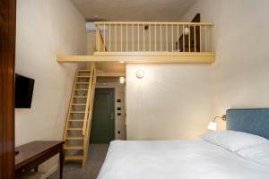 Postel nebo postele na pokoji v ubytování Boutique Hotel Paradiso