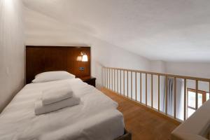Postel nebo postele na pokoji v ubytování Boutique Hotel Paradiso