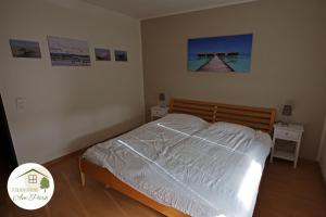Postel nebo postele na pokoji v ubytování Großzügige Wohnung am Comberg-Park