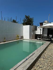 Πισίνα στο ή κοντά στο Tumbes Zorritos Bocapan Casa con piscina 3 dormitorios
