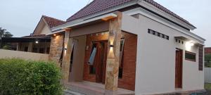 a renderización de una casa pequeña en Mutiara Homestay Jogja, en Ngingas