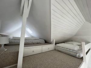 Ένα ή περισσότερα κρεβάτια σε δωμάτιο στο Studio face à la mer - Saint Cast Le Guildo