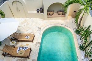 an overhead view of a swimming pool in a villa at Amani Villas: New, Luxury, Mediterranean, Private Pool, Canggu in Canggu
