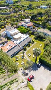 an overhead view of a building with a parking lot at Residence Palummera in Ischia