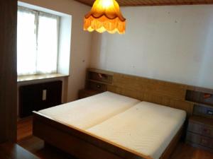 מיטה או מיטות בחדר ב-Casa Defrancesco