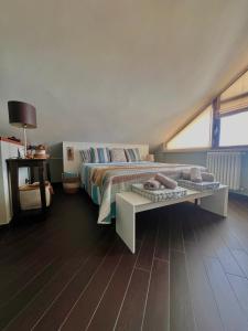 Postel nebo postele na pokoji v ubytování Un loft a Serapo