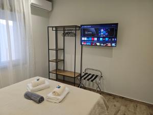Letto o letti in una camera di Lap Home Kavala