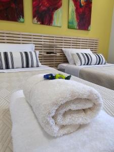 Letto o letti in una camera di Lap Home Kavala
