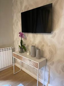 TV a/nebo společenská místnost v ubytování Il Borghetto