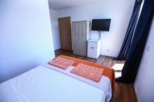 Postel nebo postele na pokoji v ubytování Villa Illyria