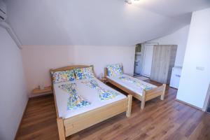 Postel nebo postele na pokoji v ubytování Villa Illyria