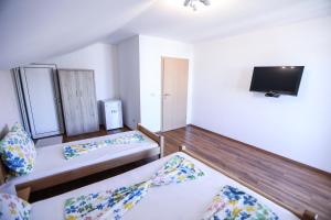 Postel nebo postele na pokoji v ubytování Villa Illyria