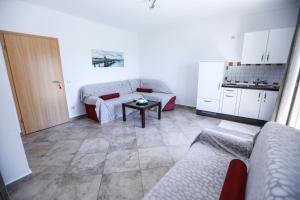 Kuchyň nebo kuchyňský kout v ubytování Villa Illyria