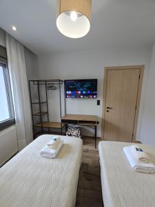 Letto o letti in una camera di Lap Home Kavala