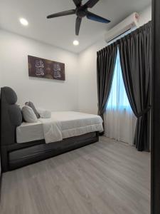 Ένα ή περισσότερα κρεβάτια σε δωμάτιο στο Klebang 9 Villa MuslimOnly