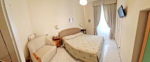Кровать или кровати в номере Hotel Toro