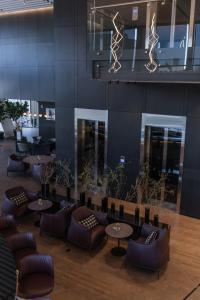 Posezení v ubytování Alexander Hotel