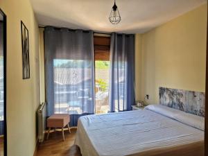 Giường trong phòng chung tại La CASUCA Del SABLE