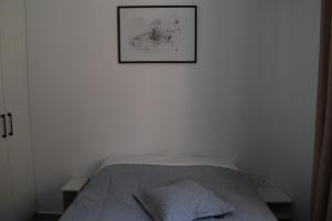 Postel nebo postele na pokoji v ubytování KliSy