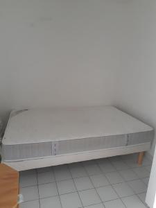 מיטה או מיטות בחדר ב-Vittoria Immobilier 6 -REGLEMENT SUR PLACE - chèques vacances acceptés