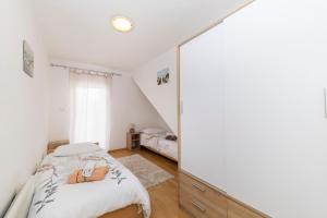 Postel nebo postele na pokoji v ubytování Ap Orion