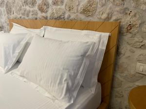 Letto o letti in una camera di Valta Hotel