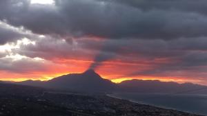 a view of a mountain under a cloudy sky at Villa Verde in Cefalù