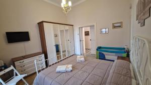 A bed or beds in a room at B&B IL CEDRO