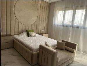 Ένα ή περισσότερα κρεβάτια σε δωμάτιο στο Villa Magnolia Meknès Oasis de paix pour famille +11 φωτογραφίες