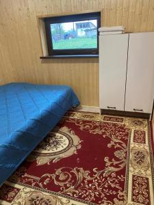 Una cama o camas en una habitación de САБЫРЖАН