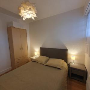 Llit o llits en una habitació de Superbe vue sur mer à Sète